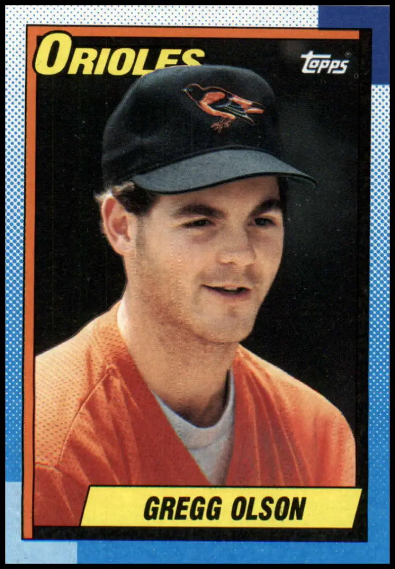 1990 Topps #655 Gregg Olson NM-MT Baltimore Orioles Baseball Card in orange jersey