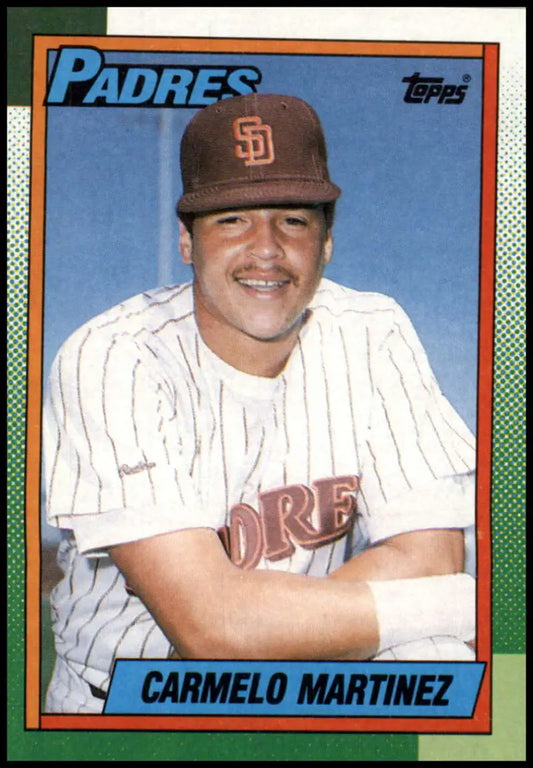 1990 Topps #686 Carmelo Martinez San Diego Padres Baseball Card in pinstripe uniform