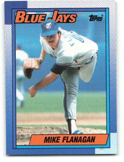1990 Topps #78 Mike Flanagan baseball card of Toronto Blue Jays pitcher mid-delivery