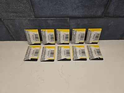 Unopened Topps Dick Tracy wax packs featuring yellow and white packaging for sports trading cards