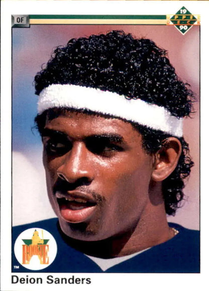 Deion Sanders in navy jersey and white headband on New York Yankees baseball card