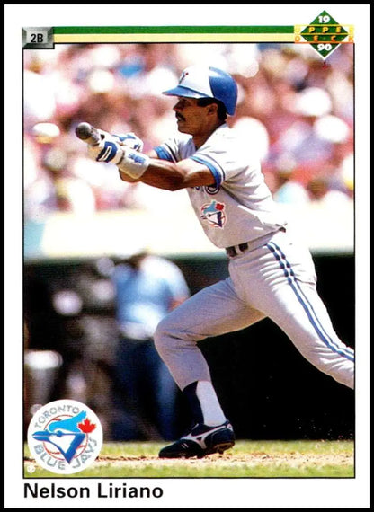 Nelson Liriano in Toronto Blue Jays uniform preparing to bunt for baseball card