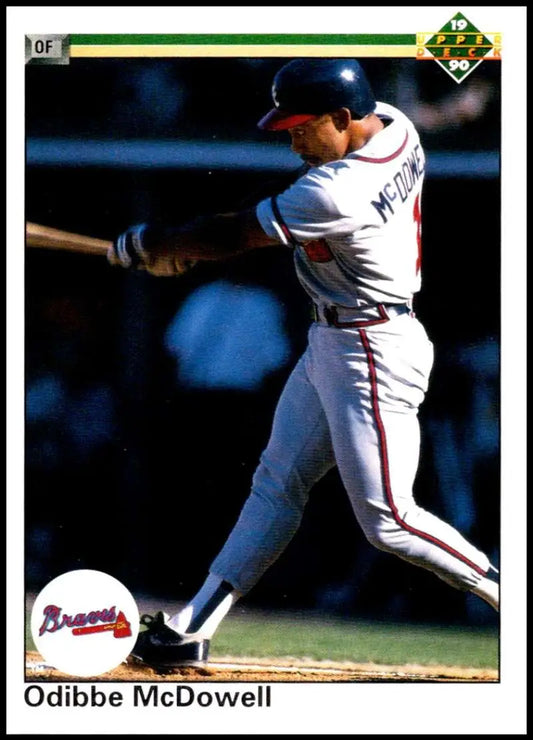 Baseball player Oddibe McDowell swinging bat in Atlanta Braves uniform on card