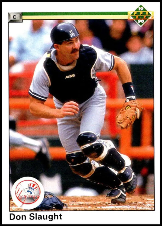 Don Slaught crouching as a catcher in New York Yankees uniform for baseball card
