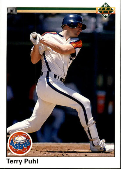 Terry Puhl swinging bat in white Houston Astros uniform on Upper Deck baseball card