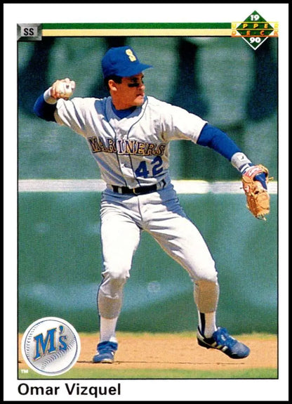 Seattle Mariners player Omar Vizquel in white uniform throwing a baseball card