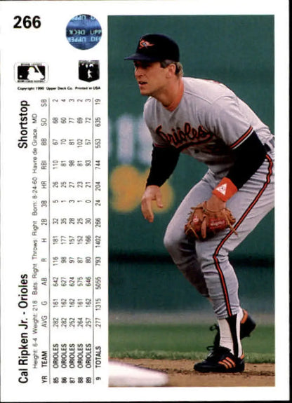 Cal Ripken Jr. fielding at third base on a 1990 Upper Deck baseball card