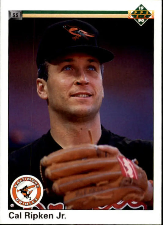 Cal Ripken Jr. in Orioles gear holding a glove on a 1990 Upper Deck baseball card