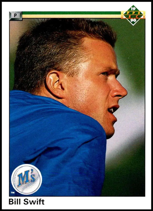 Side profile of a baseball player in a blue Seattle Mariners jacket for Seattle Mariners baseball card
