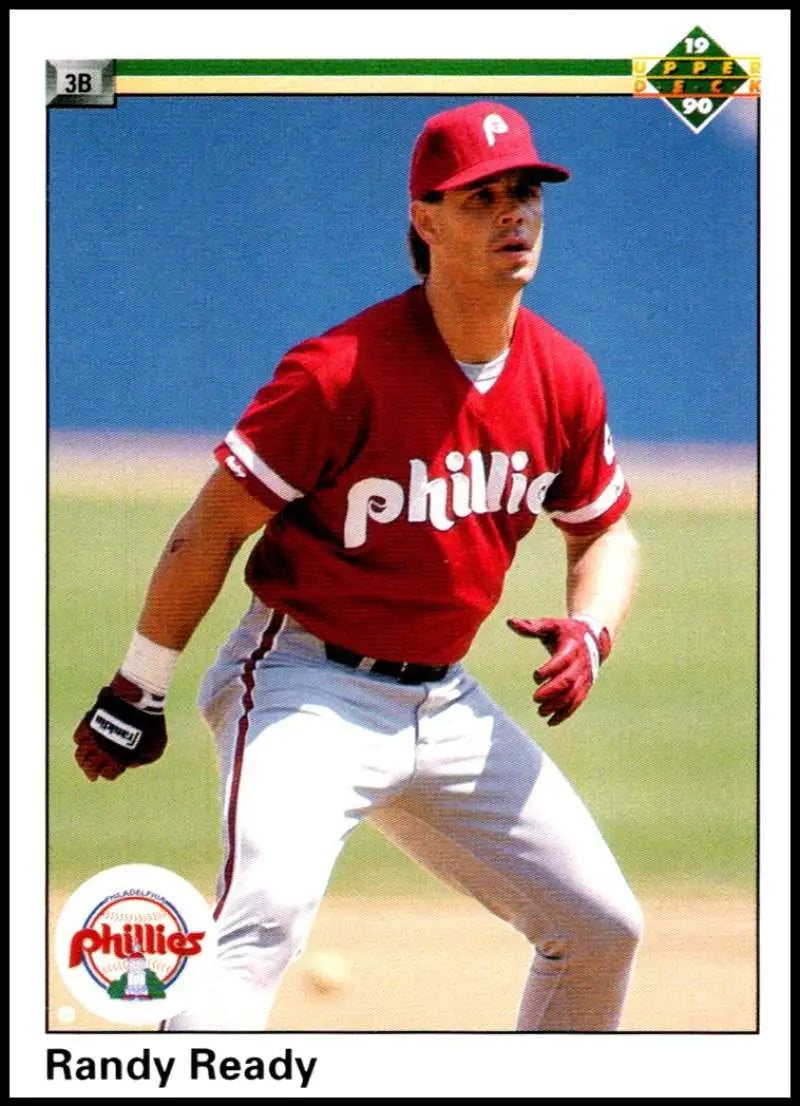 Randy Ready in red Philadelphia Phillies uniform fielding on 1990 Upper Deck baseball card