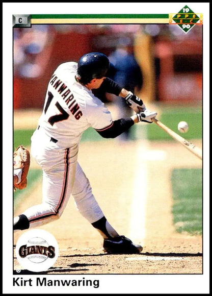 Baseball player Kirt Manwaring in San Francisco Giants uniform swinging at the ball