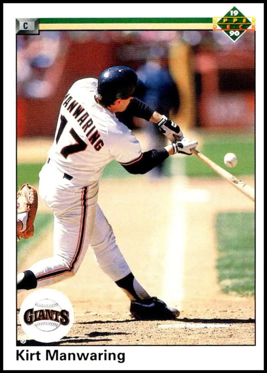 Baseball player Kirt Manwaring in San Francisco Giants uniform swinging at the ball