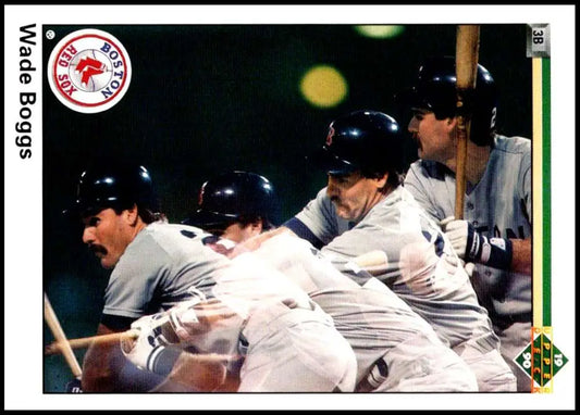 Multiple Boston Red Sox players in batting stances in a motion-style photograph