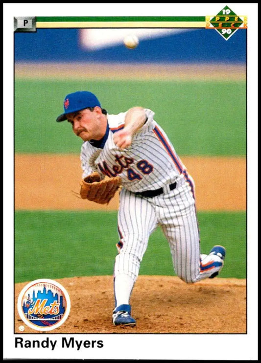 Randy Myers delivering pitch on mound in New York Mets pinstripe uniform baseball card