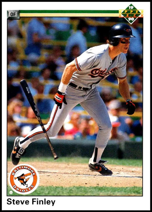 Baseball player Steve Finley in Baltimore Orioles uniform swinging bat on baseball card