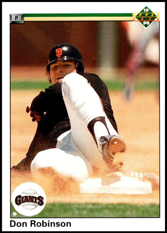 San Francisco Giants player Don Robinson sliding into base in baseball action