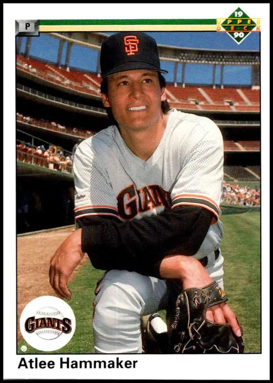 San Francisco Giants player Atlee Hammaker kneeling on the field in a white uniform