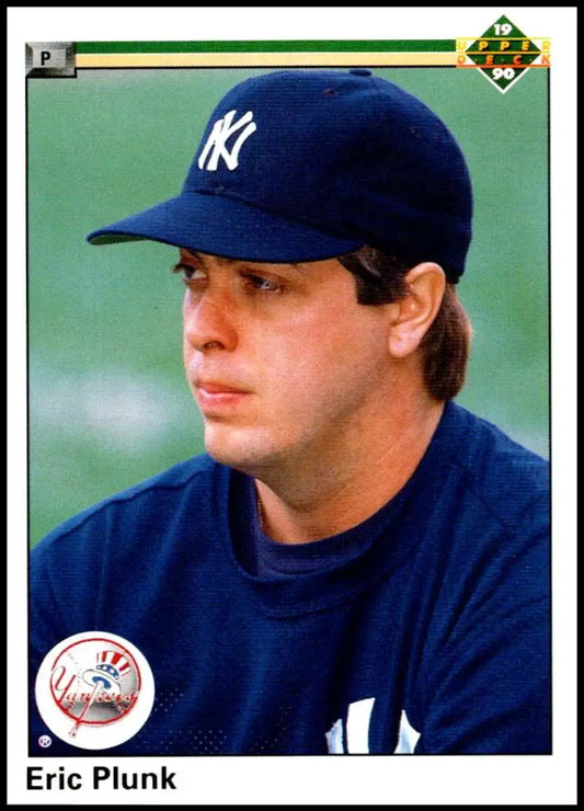 Baseball player in New York Yankees cap and uniform on Eric Plunk card