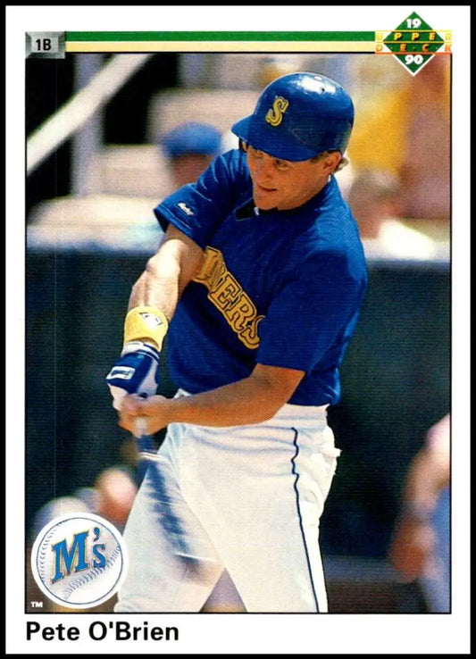 Seattle Mariners player swinging bat in blue and white uniform on baseball card