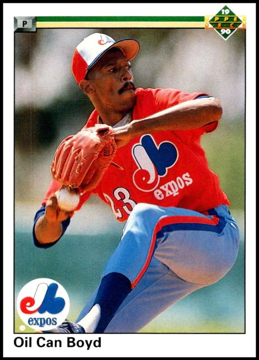 Baseball player in red Montreal Expos uniform mid-pitch on Montreal Expos baseball card