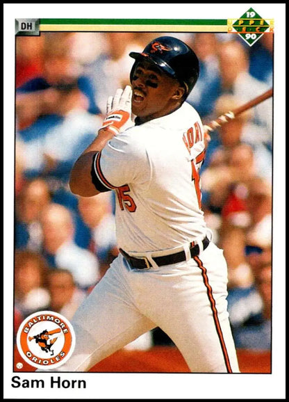 Baseball player in white Baltimore Orioles uniform swinging bat for Sam Horn baseball card