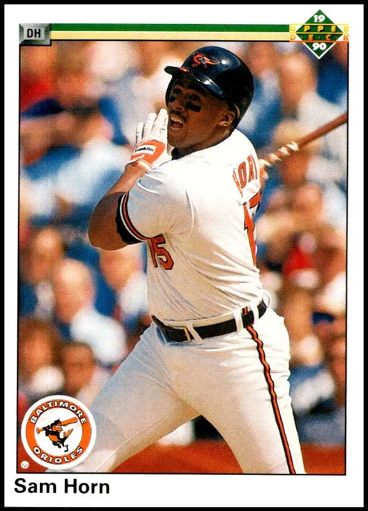Baseball player in white Baltimore Orioles uniform swinging bat for Sam Horn baseball card