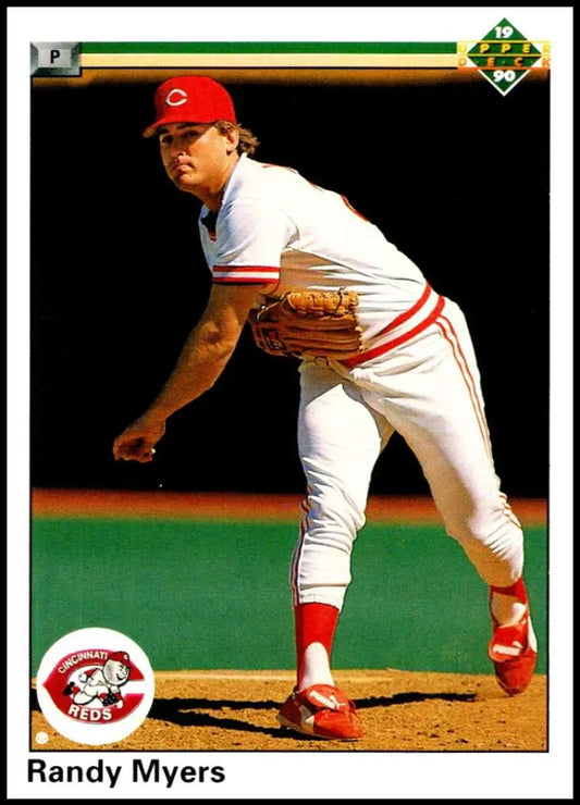 Randy Myers delivering a pitch in his Cincinnati Reds uniform on a baseball card