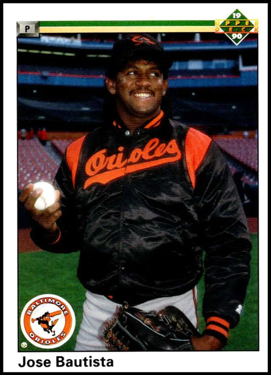 Jose Bautista in Orioles jacket holding baseball, featured in Baltimore Orioles Baseball Card