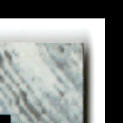 Marble slab with grey veining showcasing classic basketball Anderson Hunt #46 collectible