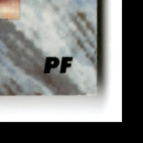 Corner of textured rectangle with PF logo from 1991-92 Classic Basketball Joe Wylie Miami Hurricanes