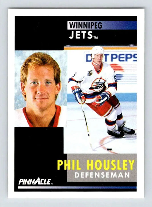 Winnipeg Jets hockey card of Phil Housley in portrait and action poses