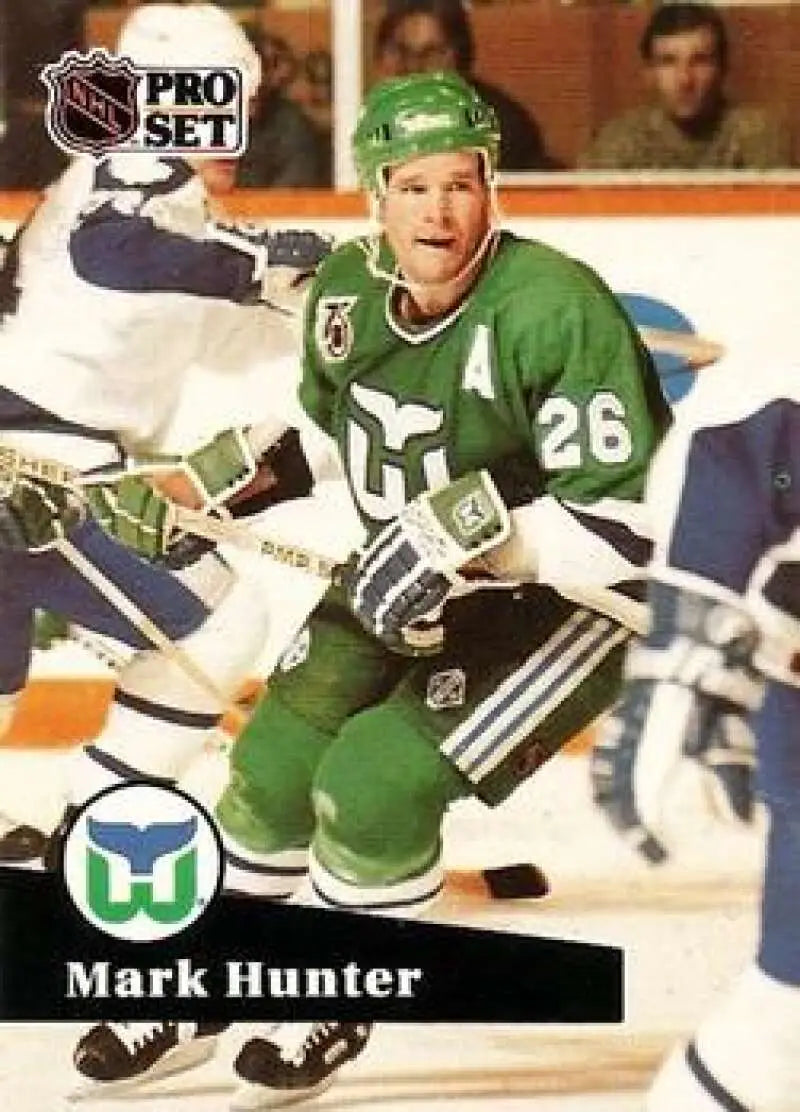 NHL Pro Set hockey card of Mark Hunter with Hartford Whalers in green jersey 26