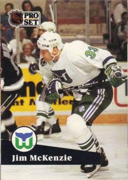 Jim McKenzie skating in a white Hartford Whalers jersey on ice
