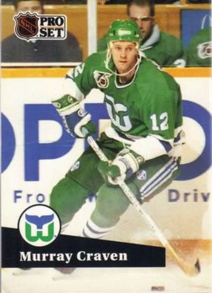 Hockey player in green Hartford Whalers jersey number 12 for Murray Craven hockey card