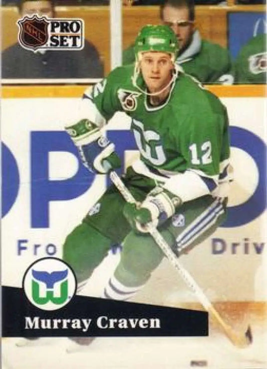 Hockey player in green Hartford Whalers jersey number 12 for Murray Craven hockey card