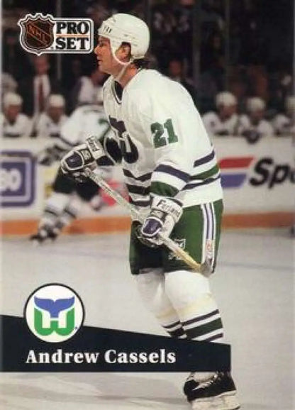 Hockey player in white Hartford Whalers jersey number 21 on Andrew Cassels hockey card