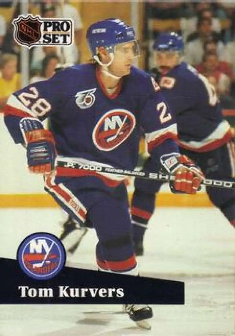 Hockey player in New York Islanders jersey #26 capturing action for Tom Kurvers card