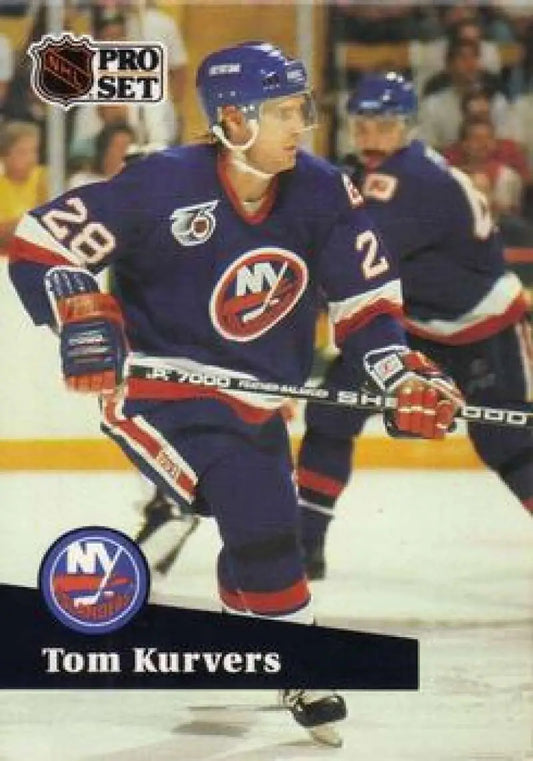 Hockey player in New York Islanders jersey #26 capturing action for Tom Kurvers card