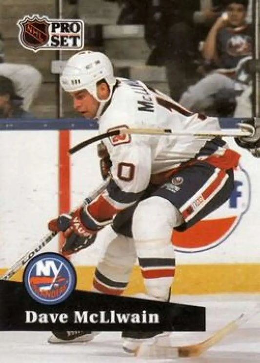 Hockey player in a white New York Islanders jersey skating for New York Islanders hockey card