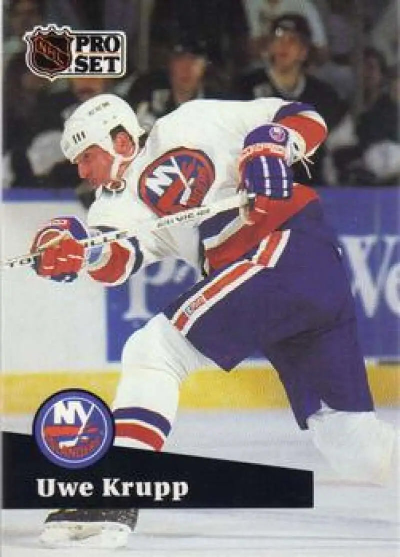 NHL Pro Set hockey card of Uwe Krupp with New York Islanders in action
