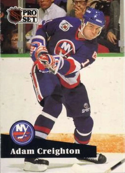 NHL Pro Set hockey card of Adam Creighton with New York Islanders in action