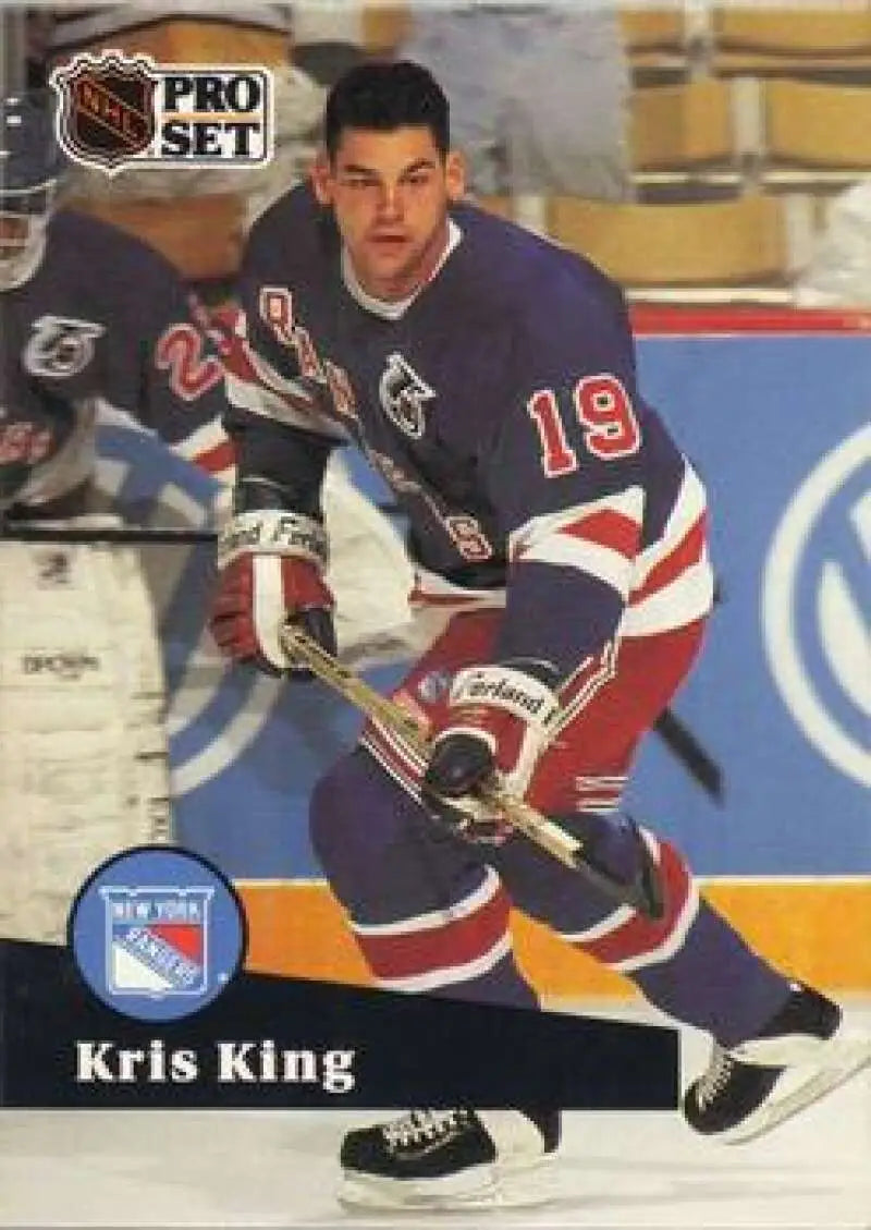 Hockey player in New York Rangers jersey #19 showcasing Kris King action on ice