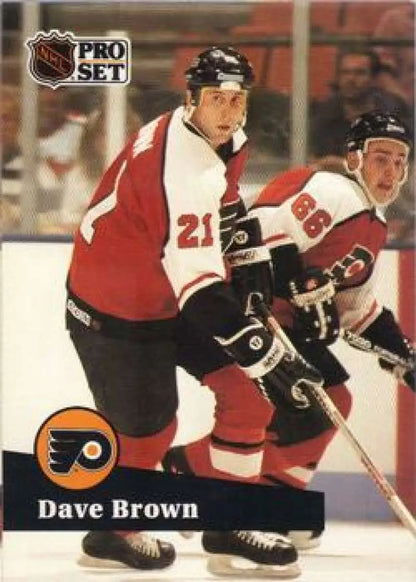 NHL Pro Set hockey card of Dave Brown wearing Philadelphia Flyers jersey #21 in action