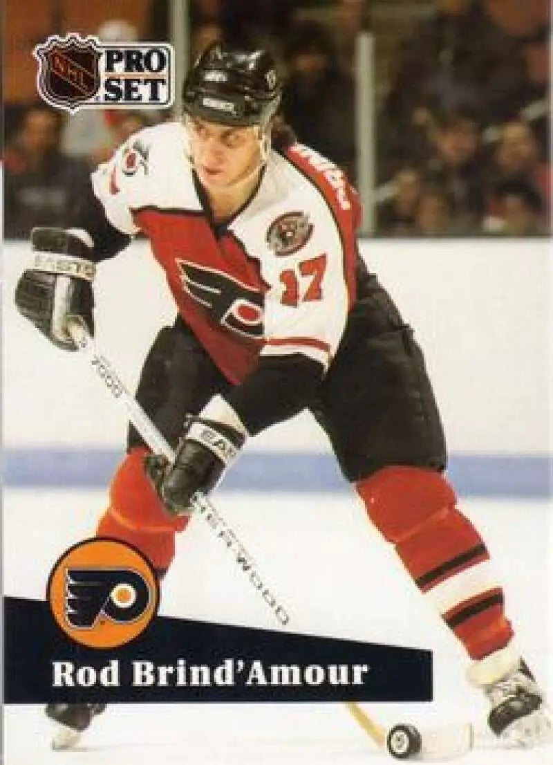 Hockey player in Philadelphia Flyers uniform skating with stick on Rod Brind’Amour card