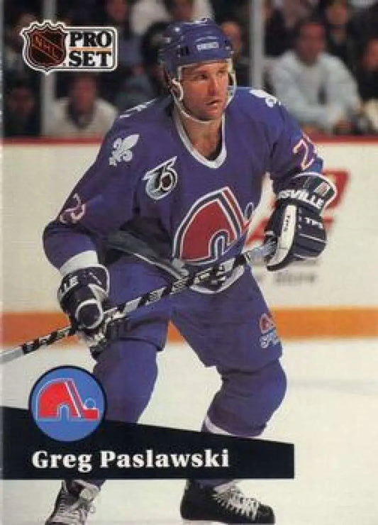 Hockey player in Quebec Nordiques jersey number 25 for Greg Paslawski hockey card