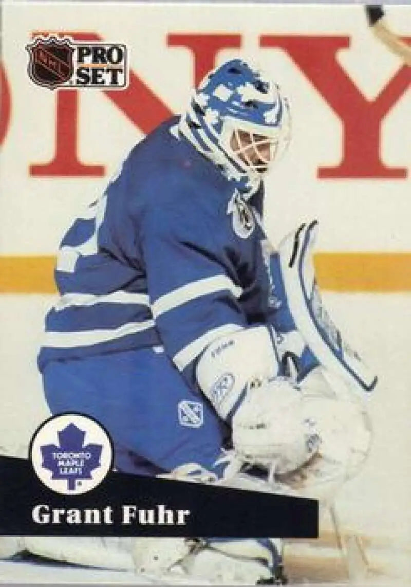 NHL Pro Set card of Grant Fuhr making a save for Toronto Maple Leafs in blue uniform