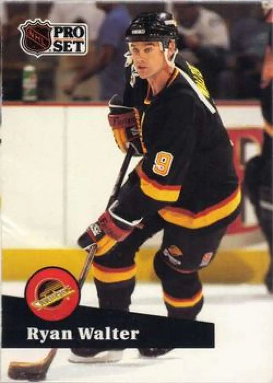 Hockey card of Ryan Walter in 1990s Vancouver Canucks black and yellow uniform Pro Set