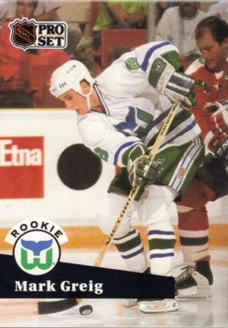 Hartford Whalers player Mark Greig in white chasing puck on Pro Set hockey card