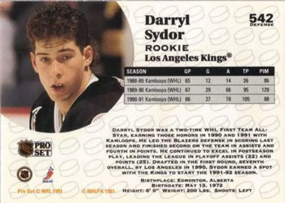 Hockey card of Darryl Sydor from the Los Angeles Kings in black and white uniform