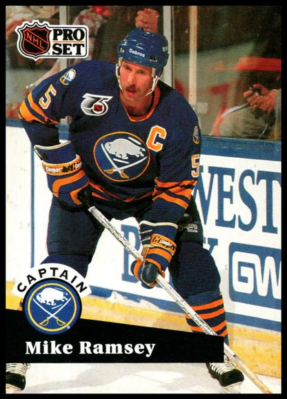 Hockey player in Buffalo Sabres uniform with captain’s C for Mike Ramsey card